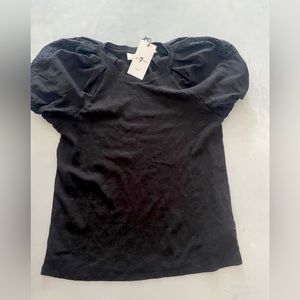 Women’s shirt with pattern designs on the shoulder